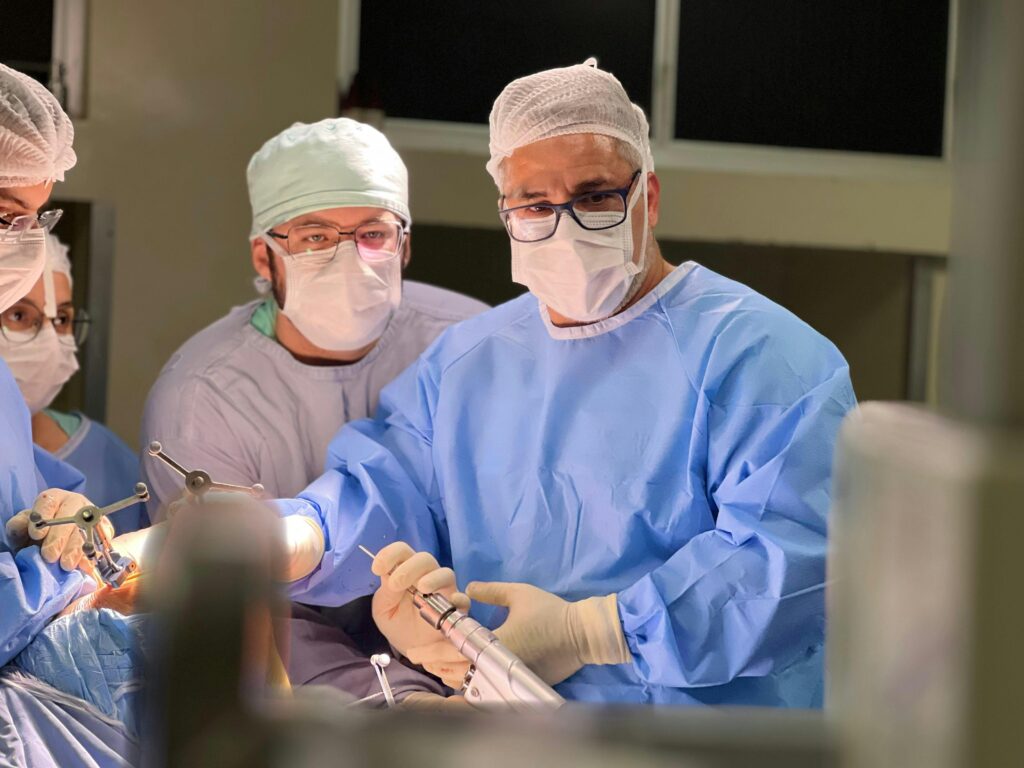 Medical team of surgeons performing surgery in a hospital operating room in Goiânia, Brazil.